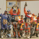 CCR-dakar-2006-bike-category-podium-winner-marc-coma-celebrates-with-2-cyril despres- en -gio -